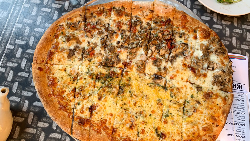 Cheesy pizza on the table