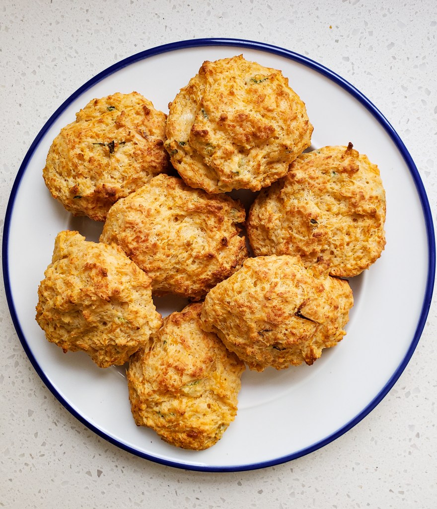 A plate stacked with biscuits